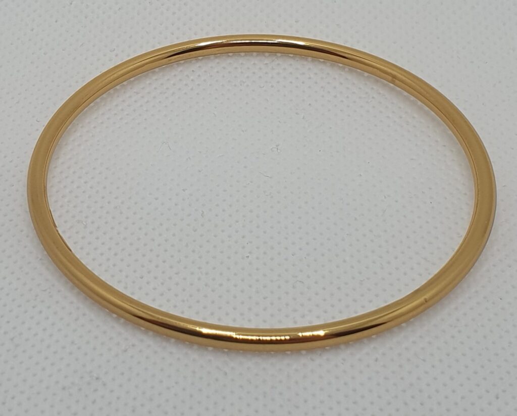 Pulsera rígida de acero con baño de oro, 6,50 cms diametro (0401000006)
