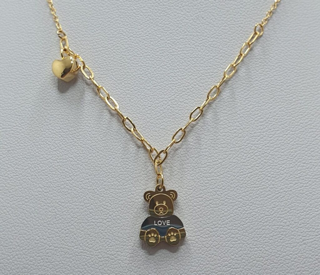 Gargantilla de acero con baño de oro, oso en dorado y plateado, 40 cms de largo + 5 cms de extension (2401000025)
