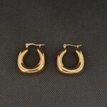 Pendientes de acero dorado (01010091)